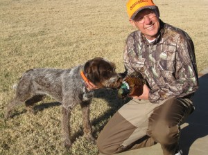 Cliff and Belle (9 month old female Wirehaired Pointing Griffon) with her first pheasant