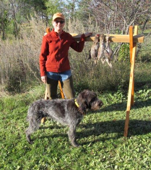 Susan and TracHer with a limit of sharp-tailed grouse.