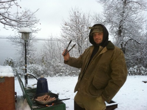 Random pic of Lou cooking since there is no pheasant pic.  It snowed Saturday night, so this must be Sunday morning.
