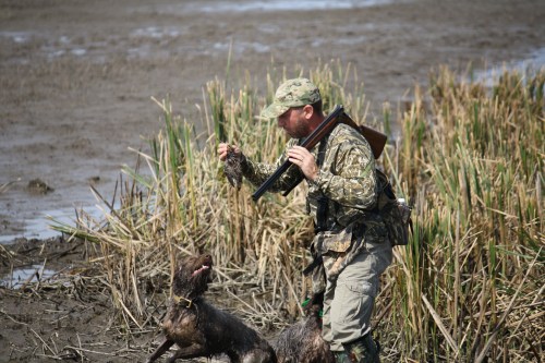 Charles and Fire inspecting a snipe.