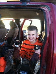 10 year-old Conrad and the Thanksgiving roosters.