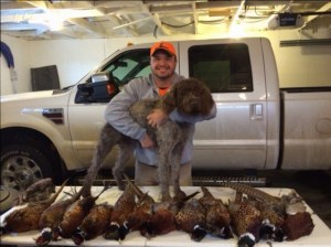 Ernie and Duncan with another mess of roosters.