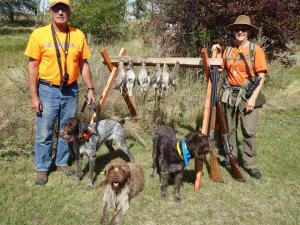 Tom and Susan with TracHer at the right, and a load of sharptailed grouse